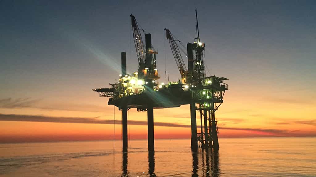 Sunset image of offshore rig platform