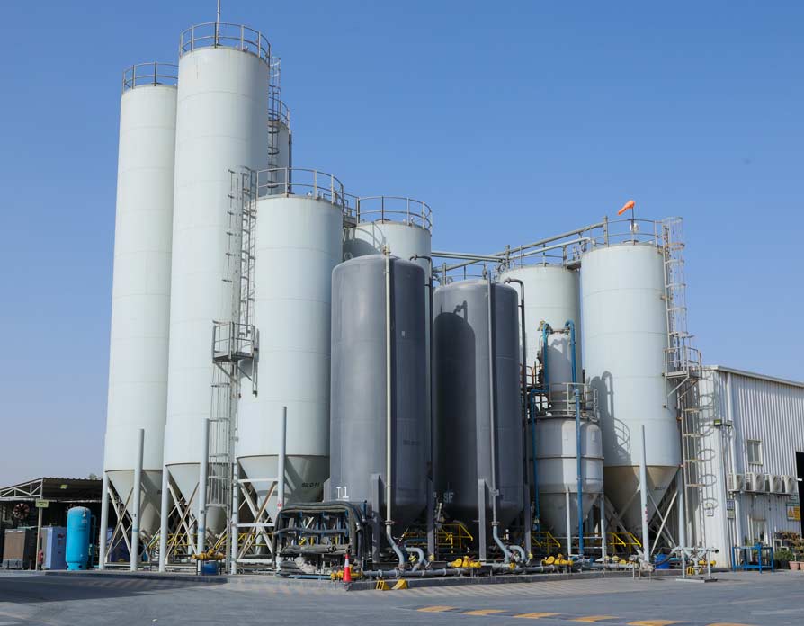 Top view of facilities. Includes buildings, trucks and tankers.