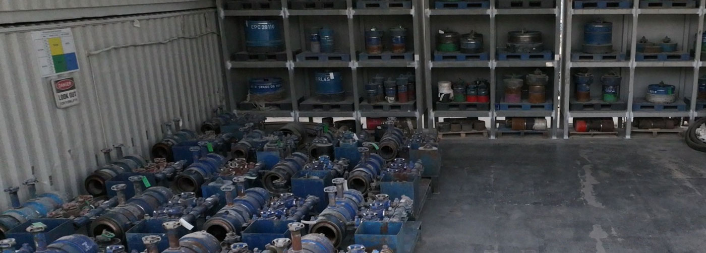 Cement heqads and accessories stackd on shelves in a warehouse