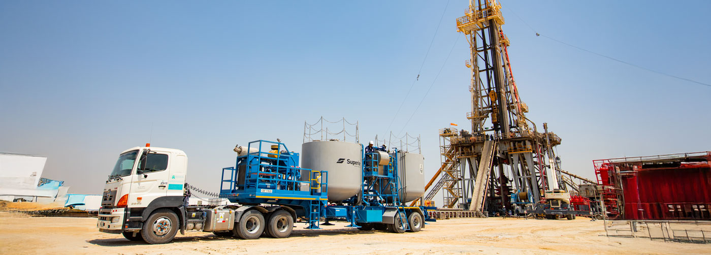 A man working on oil well packers